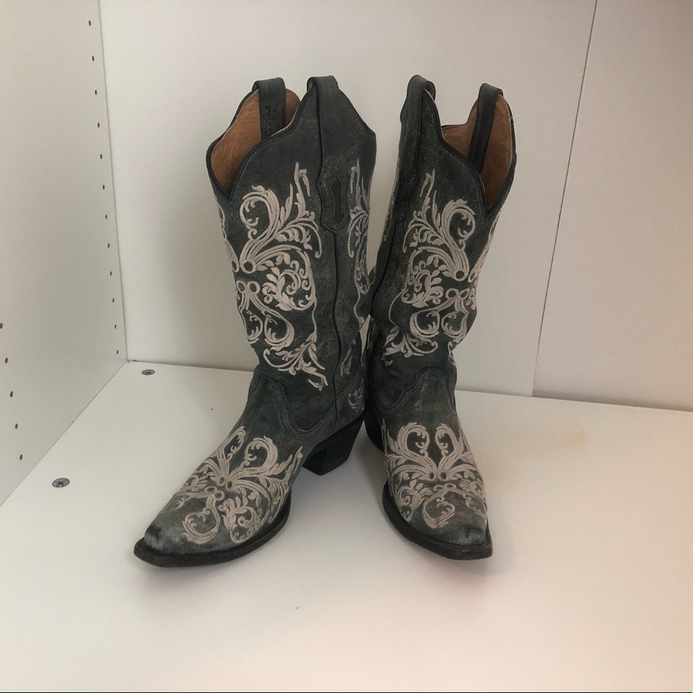 Leather bottom cowboy boots with 2 inch heel
